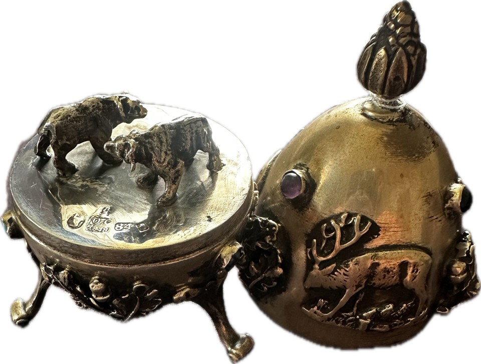 Russian silver egg featuring forest animals